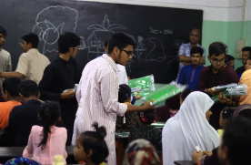 Distribution of essential educational materials to underprivileged students of Notre Dame Literary School by Rotaract Club of Notre Dame College 2
